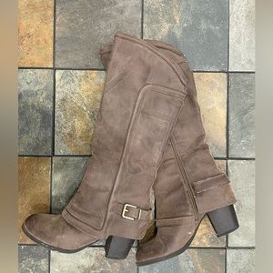Tall brown heeled boots
